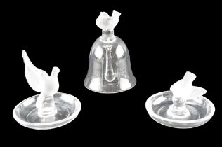 Two Lalique glass ring dishes, respectively modelled as a dove and a robin, together with a