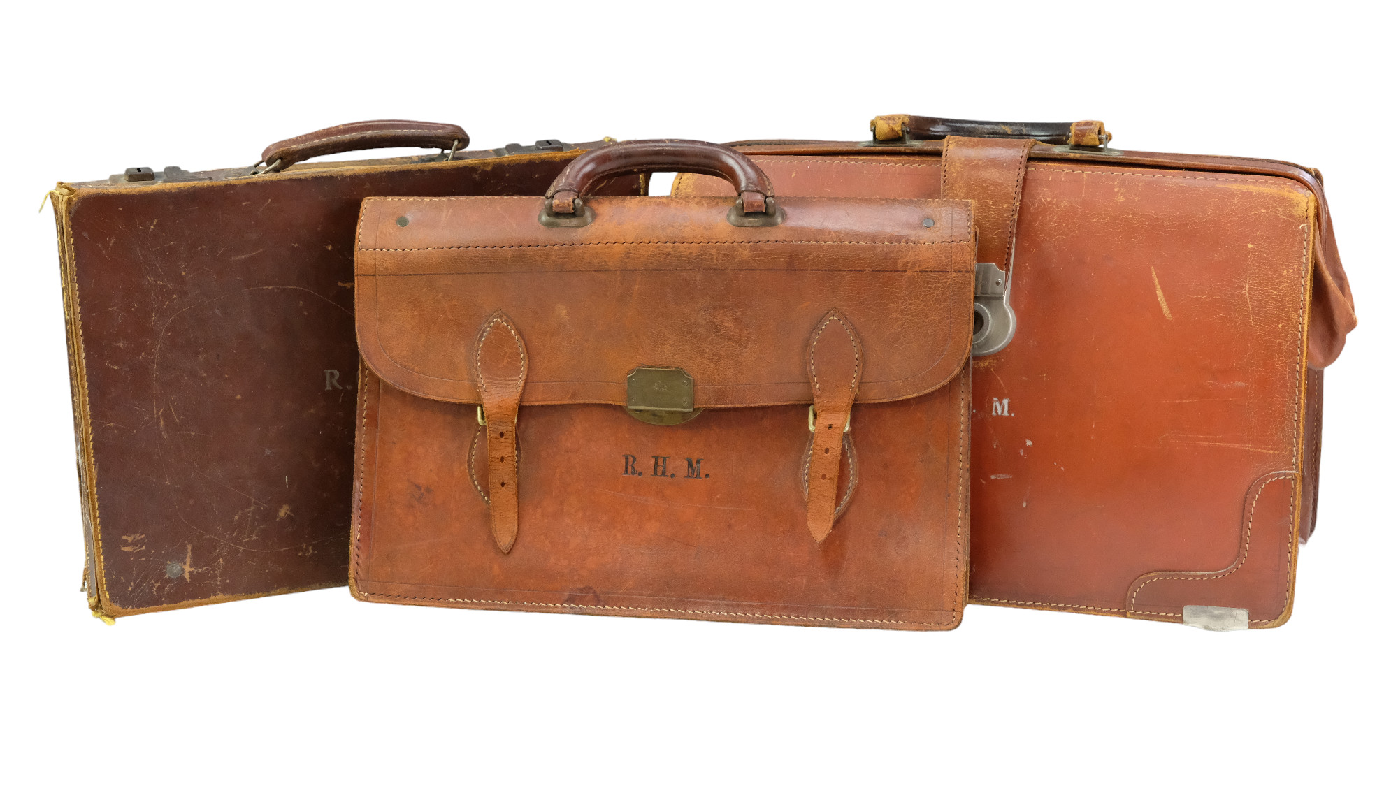 Three vintage leather bags / satchels, early-to-mid 20th Century, largest 43 x 28 x 15 cm
