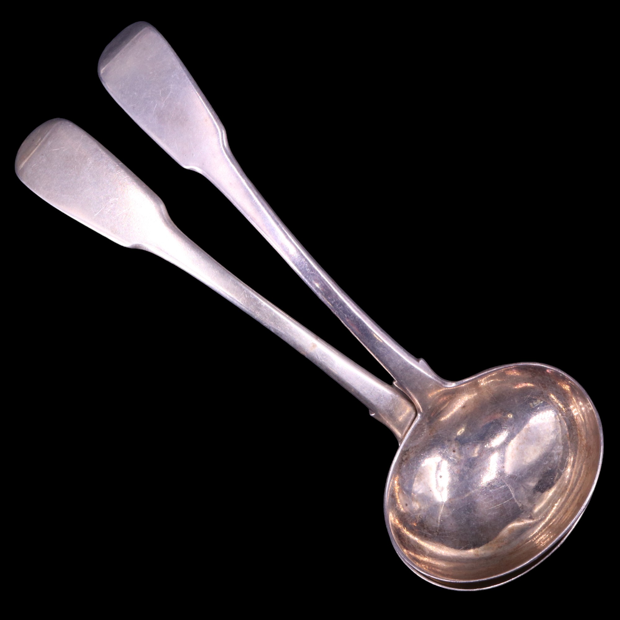 A pair of Regency silver fiddle pattern sauce ladles, likely William Eaton, London, 1818, 17 cm, 107