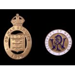 A Great War "Prisoners of War Help" enamelled lapel badge together with a 1915 "On War Service"