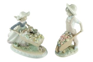 Two Lladro figurines of a boy and a girl with wheelbarrows, tallest 24 cm
