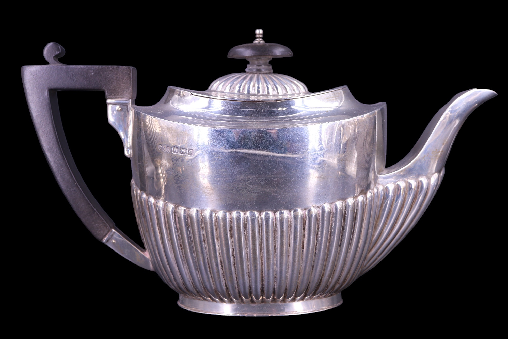 An early 20th Century silver four-piece tea service, in a Georgian gadrooned pattern with ebony - Image 2 of 20