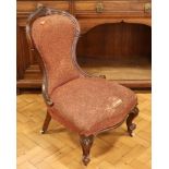 A Victorian upholstered spoon-back nursing chair