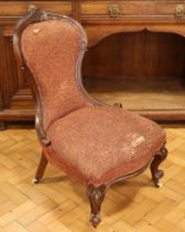 A Victorian upholstered spoon-back nursing chair