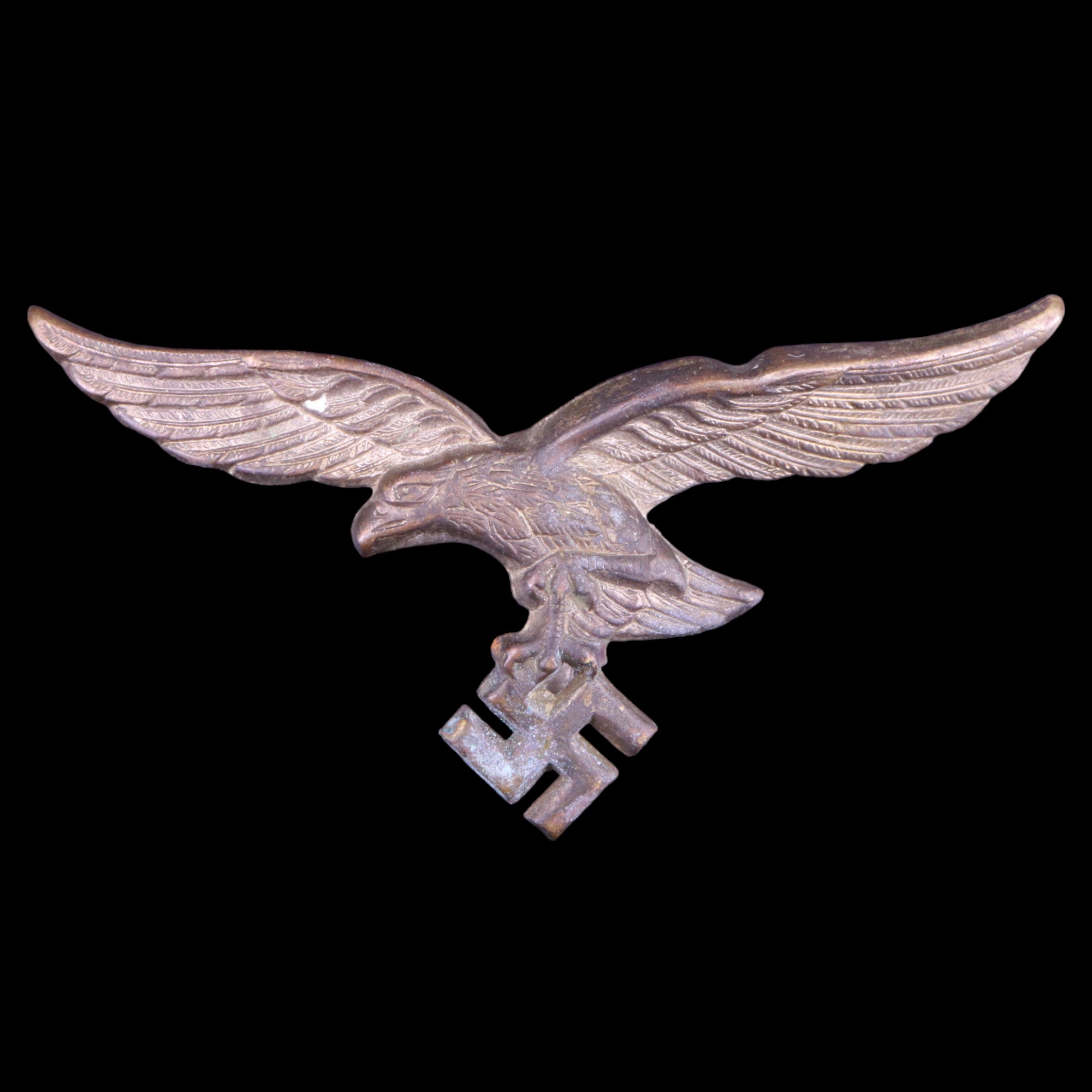 A German Third Reich Luftwaffe peaked cap badge, 68 mm