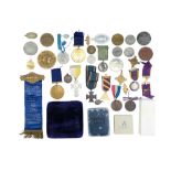 A group of medals, medallions and tokens including a cased John Hardie Medal, St Johns Ambulance,