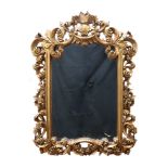 A large late 20th Century gilt framed wall mirror, 107.5 x 77 cm overall