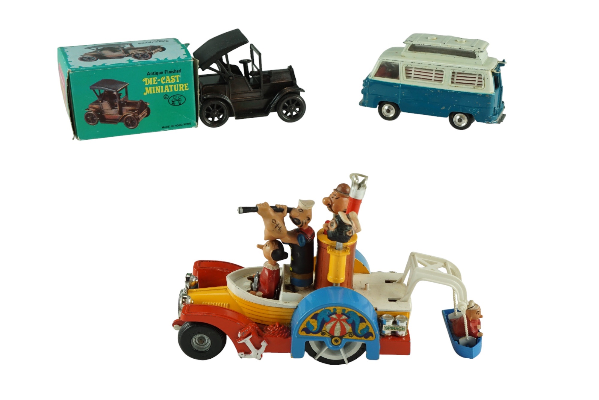 A Corgi Comics diecast Popeye Paddlewagon together with a similar Ford Thames Airbourne caravan