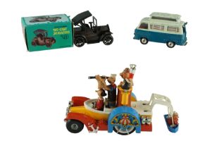 A Corgi Comics diecast Popeye Paddlewagon together with a similar Ford Thames Airbourne caravan