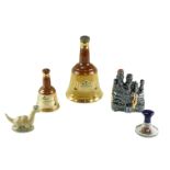 Two Bells whisky decanters, aBeswick Nessie, Pussers Rum decanter etc