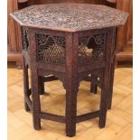 An early 20th Century Indian Hoshiarpur carved wooden folding table, 61 cm x 63 cm high