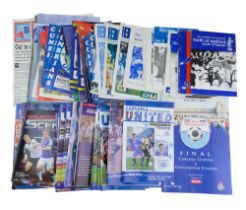A collection of 1990s and later Carlisle United Football Club matchday programmes together with team