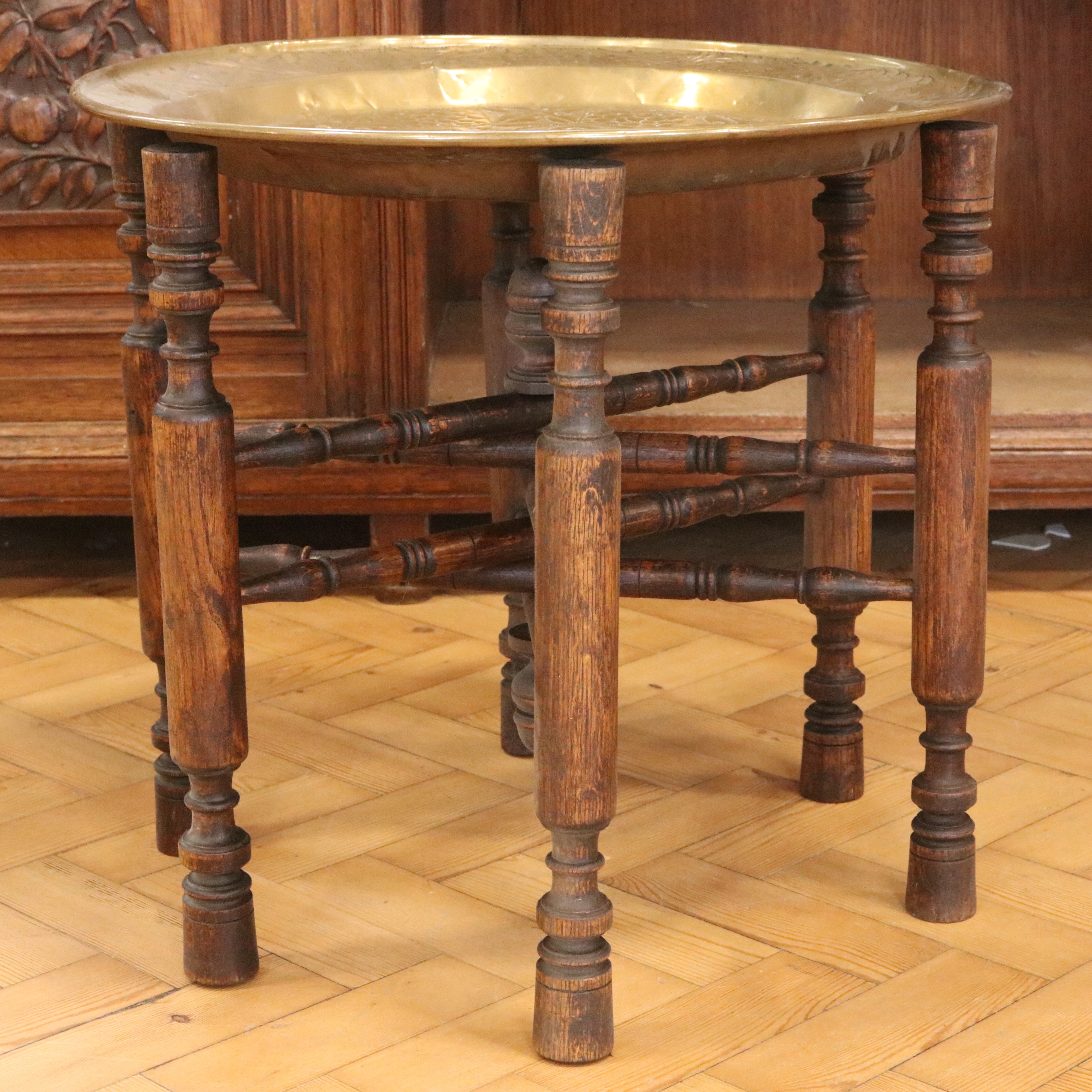 An early-to-mid 20th Century North African brass-topped folding table, 55 cm x 51 cm - Image 2 of 3