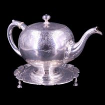 A George II Scottish silver teapot and stand, the former of compressed bullet form decorated with