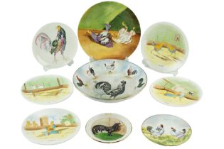 Six late 20th Century Joan North hand-painted cockerel plates and a bowl, their bases signed and