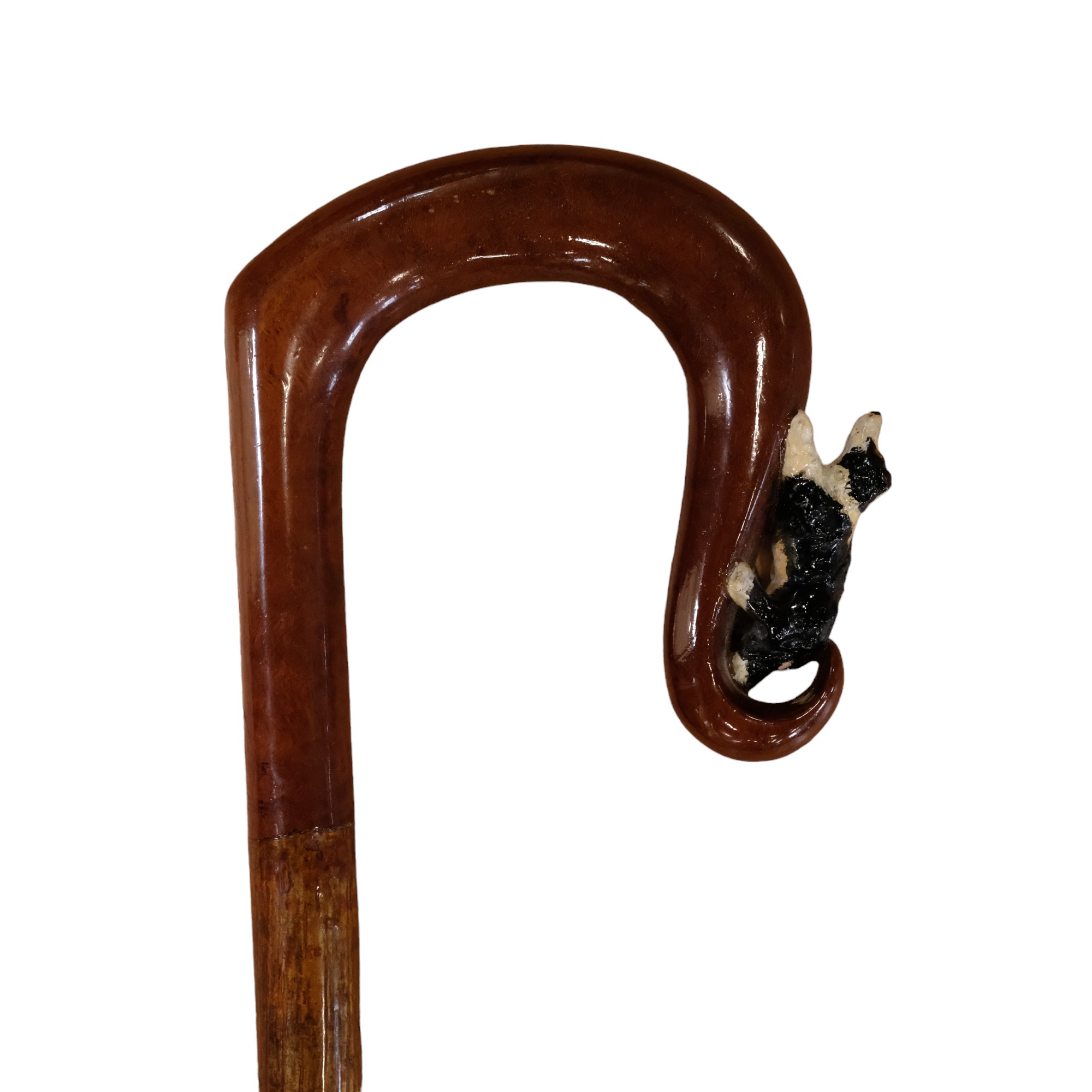 A hand-crafted shepherd's style walking stick, its crook-like walnut handle carved and painted in - Image 2 of 2