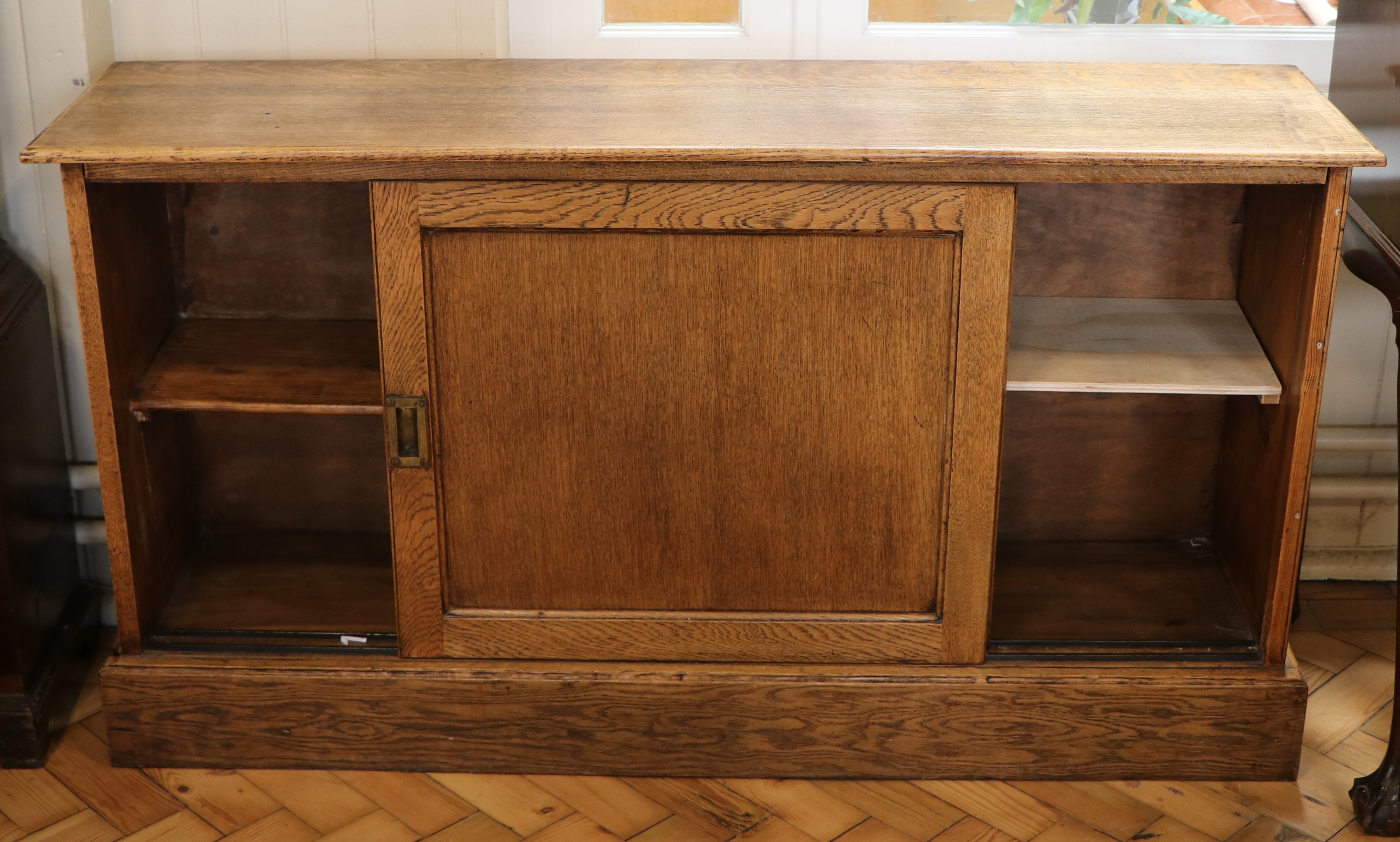 A late 19th / early 20th Century office oak and pine sliding-door cabinet, 128 cm x 30 cm x 70 cm - Image 2 of 2