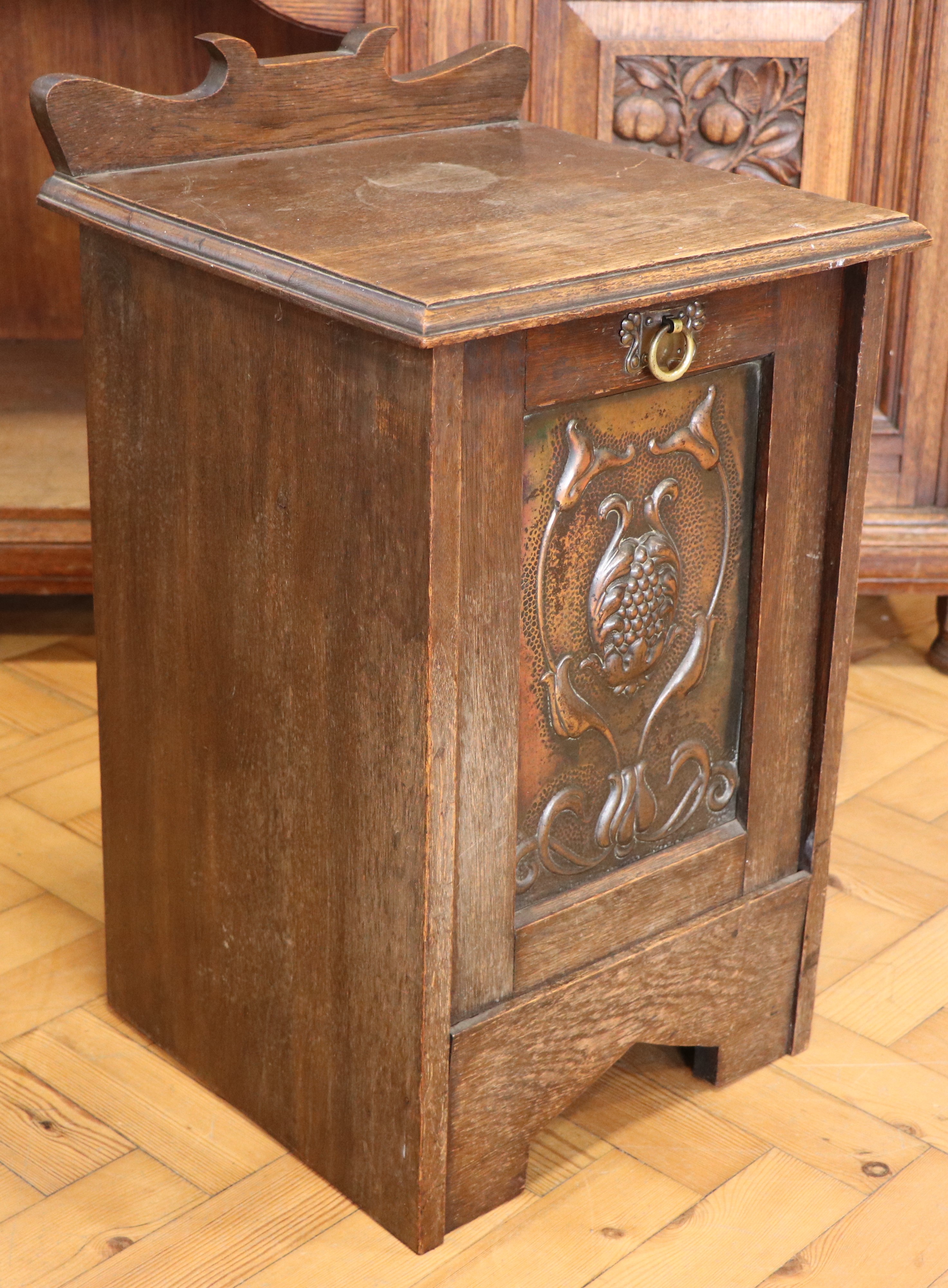 A late 19th / early 20th Century coal box / purdonium its fall-front incorporating an Art Nouveau