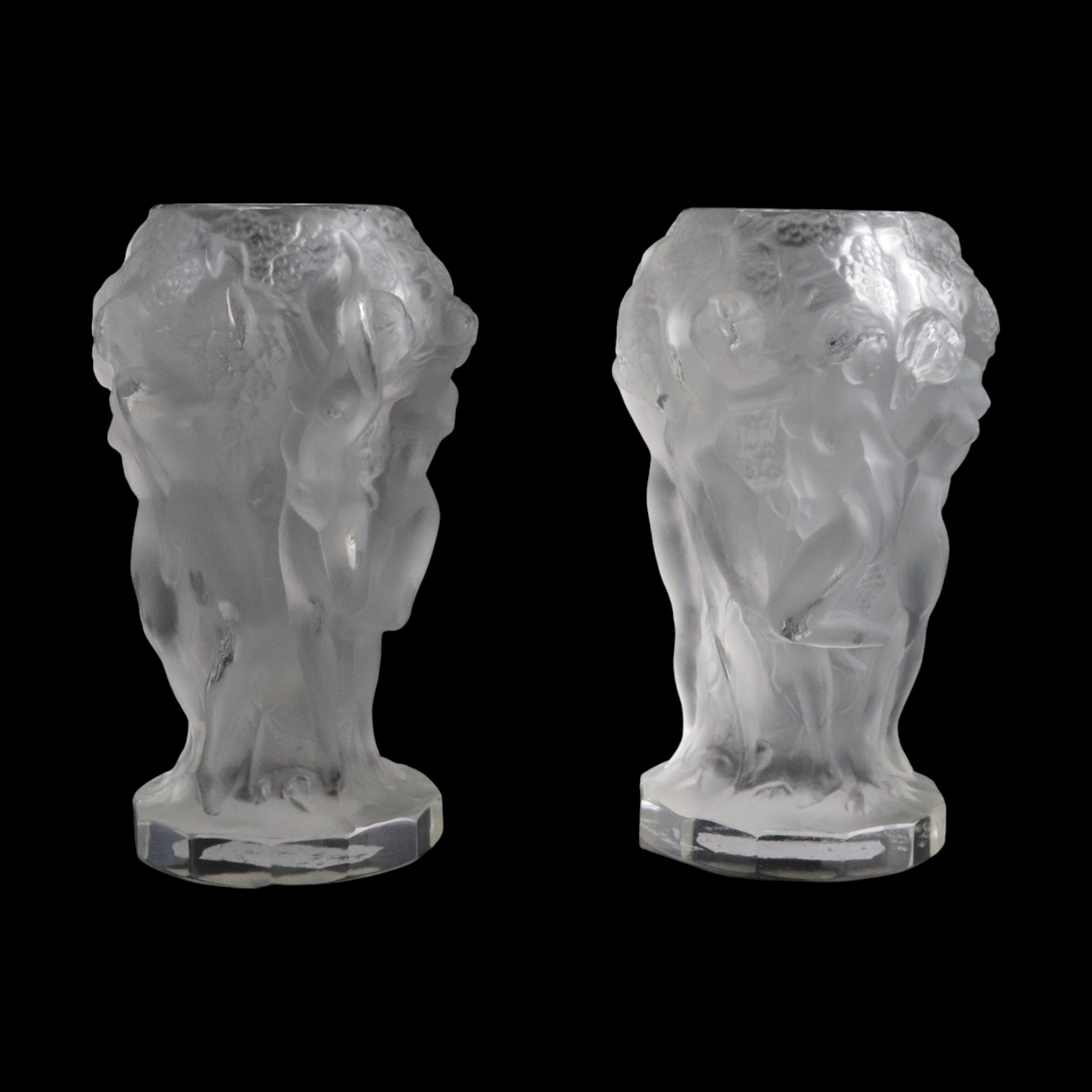 Two Art Deco frosted glass vases depicting nude women amongst berry vines, in the manner of Heinrich