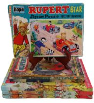 Five vintage Rupert Bear annuals together with a jigsaw, etc