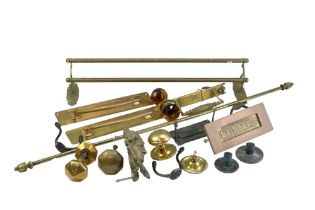 A large group of Victorian and later architectural metalwork including a towel rail, letter boxes,
