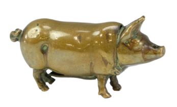 A Victorian novelty brass vesta case in the form of a pig , 5 x 2 cm