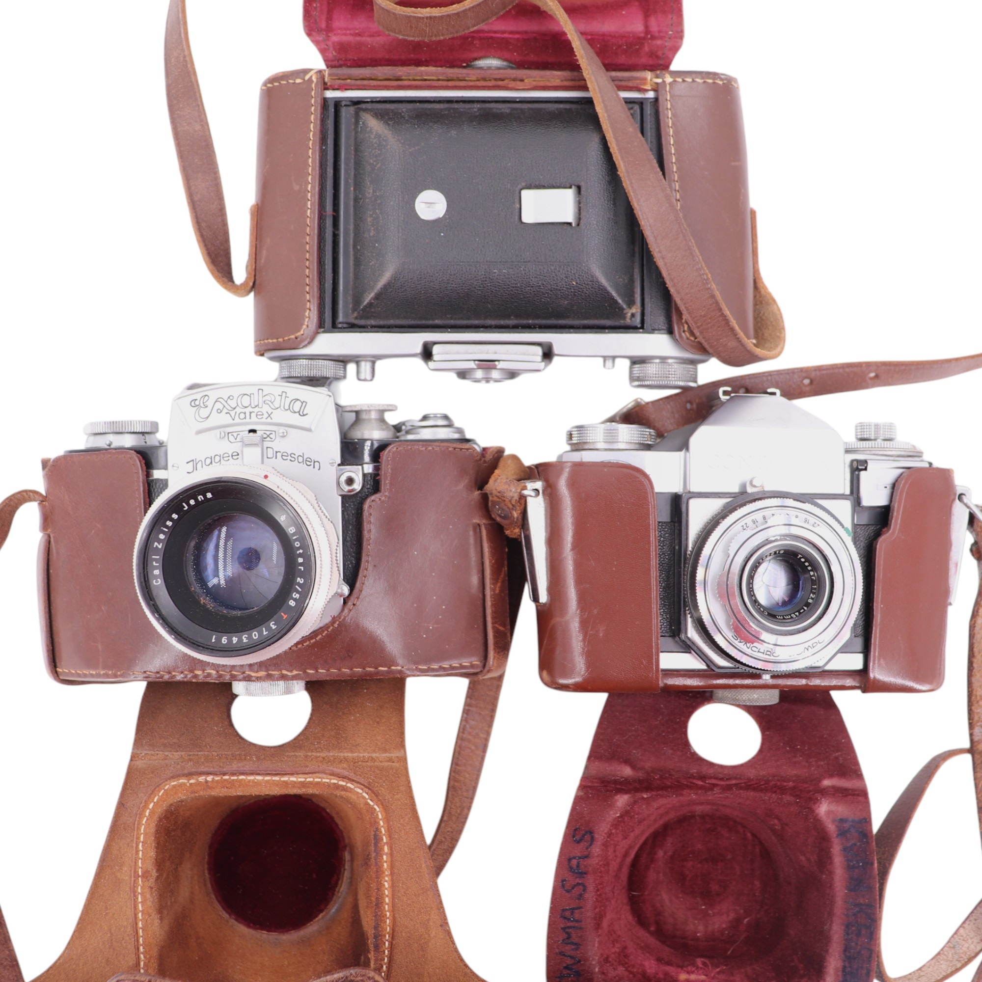 Three vintage rollfilm cameras: an Exacta Verx, a Zeiss Ikon Contaflex and a Ross Ensign Selfix 820