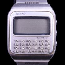 A 1978 Seiko Quartz LC stainless steel calculator wristwatch, case marked C153-5007, on a conforming