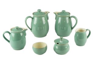 Four Denby stoneware jugs together with matching preserve pot and sugar bowl, tallest 17.5 cm