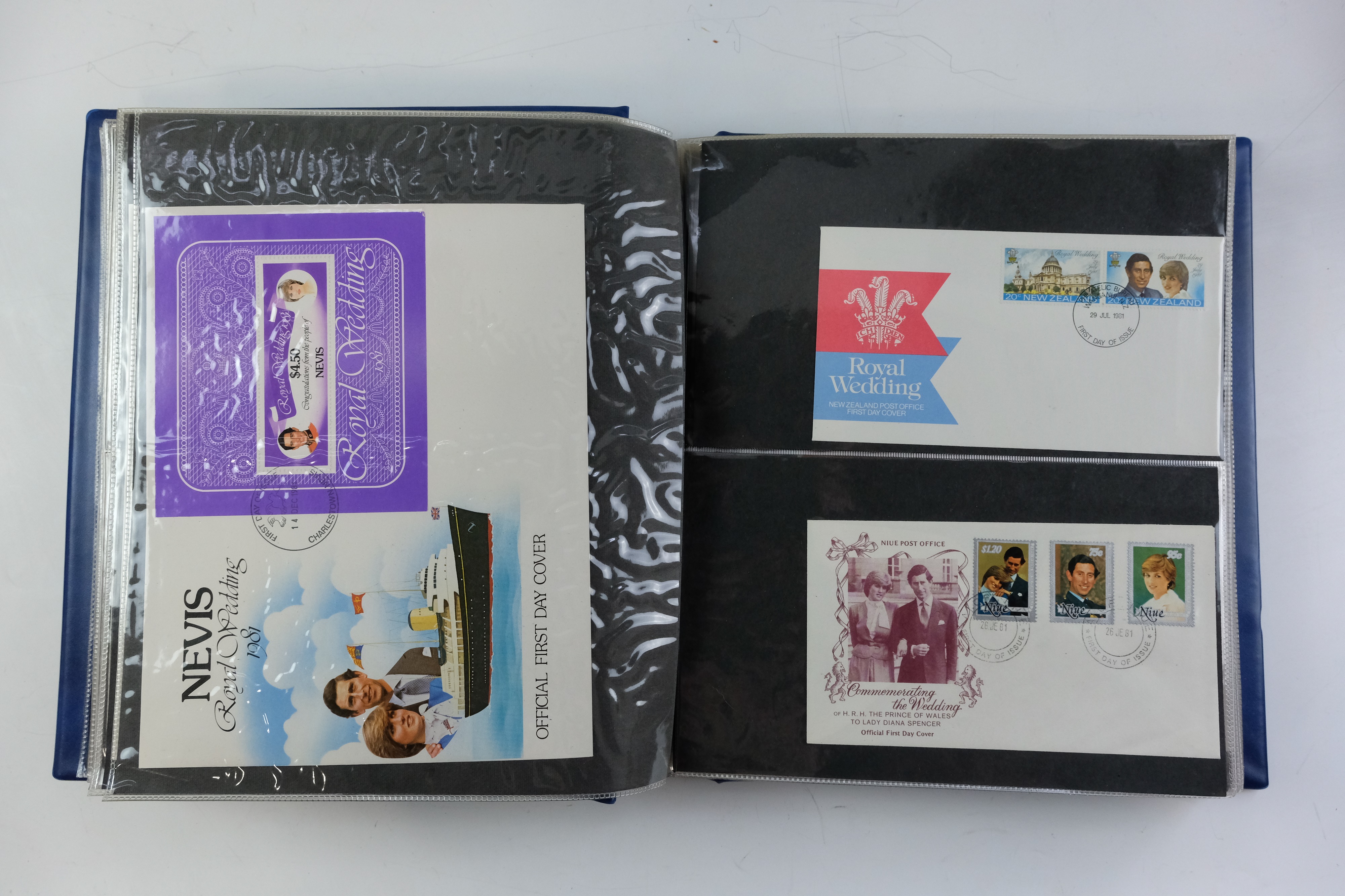 A large quantity of albums containing various world stamp covers including royal commemoratives, - Image 42 of 154