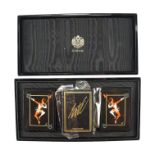 A Sobranie of London "The Art of Erté" playing cards set in a black and gilt lacquered box, box 28.5