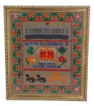 A mid-to-late 20th Century gros point needlework sampler commemorating the Silver Jubilee of Queen