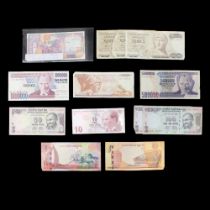 An album of world banknotes including Somalia, Bank of India, Turkey, Greece, etc