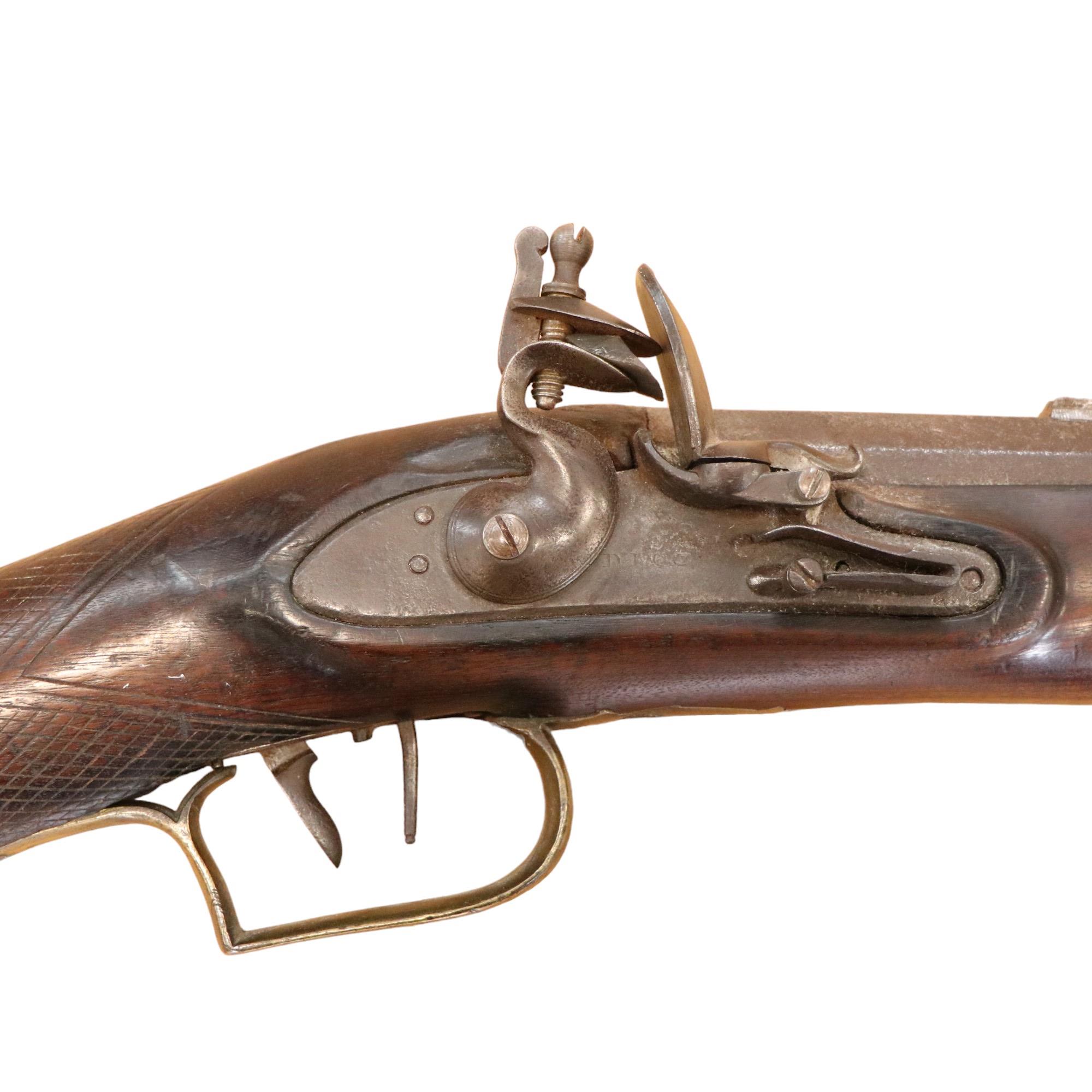 An early 19th Century flintlock rifle, having a 26-inch sighted octagonal barrel with nine-groove - Image 3 of 4