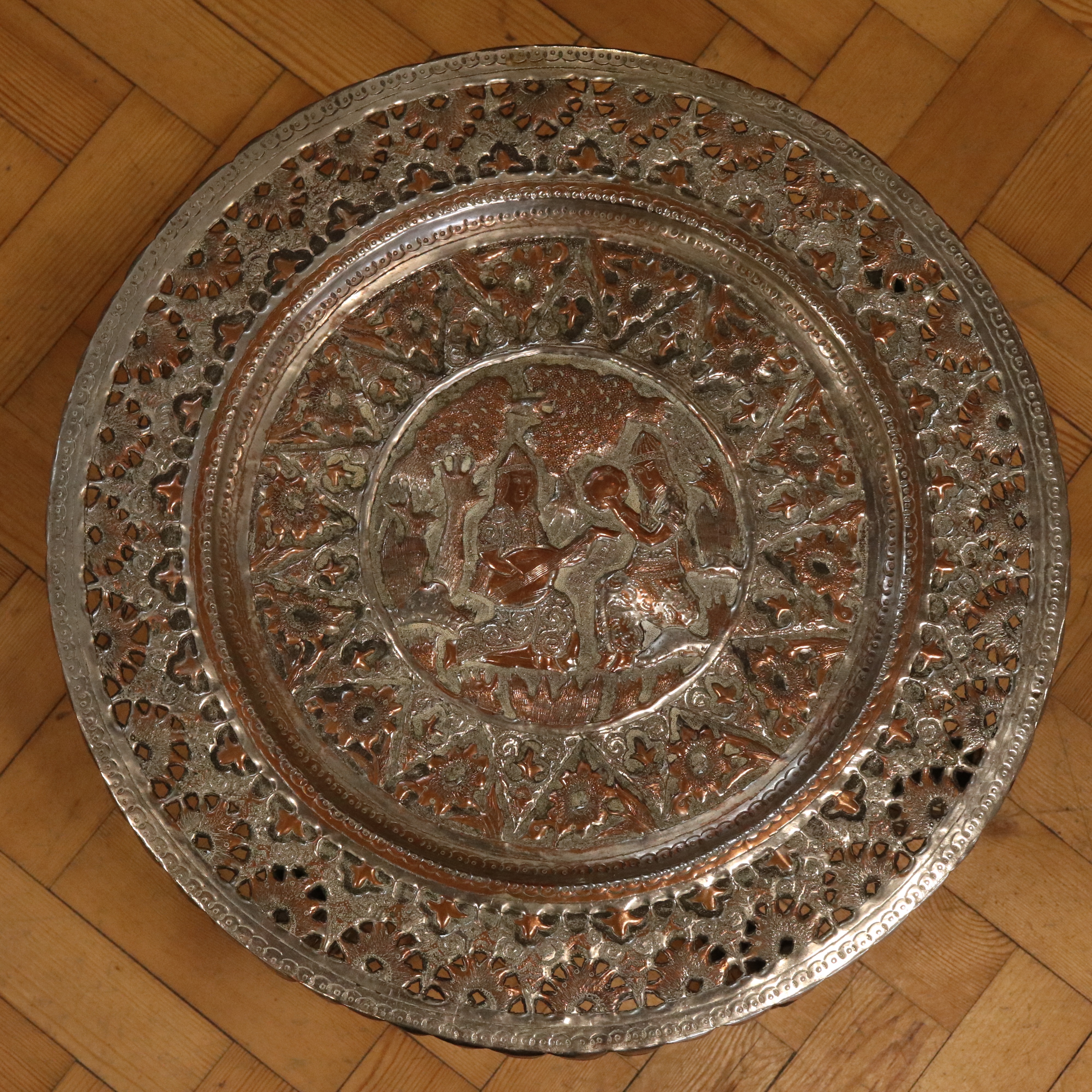 An early-to-mid 20th Century Persian copper-topped and mother-of-pearl inlaid folding table, 52 cm x - Image 3 of 4