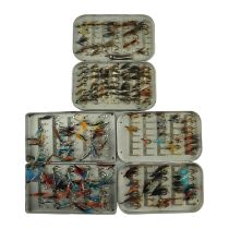 Three Wheatley fly boxes together with a large quantity of salmon / trout flies