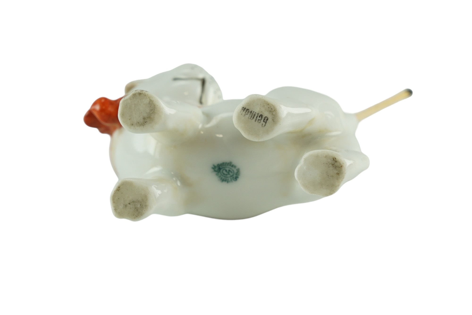 An early 20th Century Pfeffer Porcelain go-to-bed or similar dog figurine, 7.5 x 6 cm - Image 3 of 3