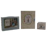 Three Beatrix Potter boxed book sets comprising "The Peter Rabbit Library", "Shaped Board Books" and