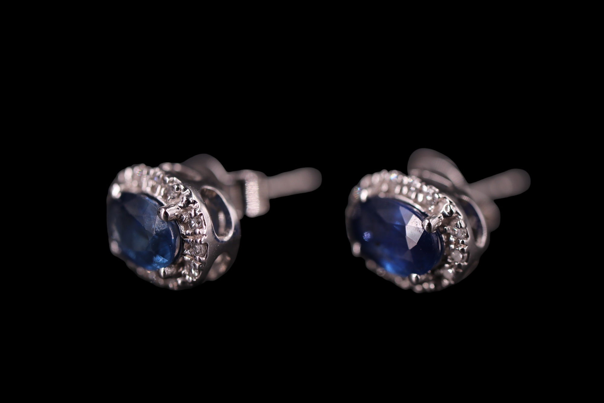 A pair of contemporary sapphire and diamond earrings, each comprising an oval-cut sapphire of approx - Image 3 of 4