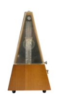 A mid-20th Century teak cased clockwork metronome by SX of Germany, 23.5 cm