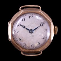 A 1930s Cyma 9 ct gold wristlet watch, having a crown-wound 15-jewel movement, silvered face,