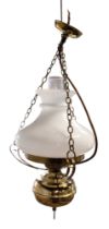A reproduction pendant brass "oil lamp" electric light fitting, having a milk glass shade, base to