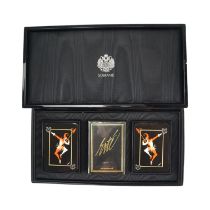 A Sobraine of London "The Art of Erté" playing cards set in a black and gilt lacquered box, box 28.5