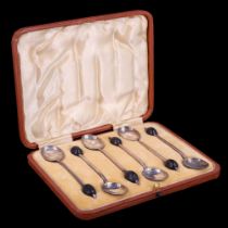 A cased set of 1920s silver coffee spoons having bean terminals, S W Smith & Co, Birmingham, 1909