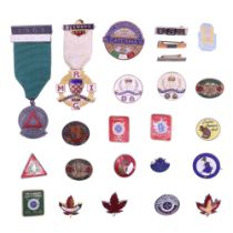 A small quantity of vintage enamelled lapel badges including Butlins Ayr 1959, Butlins Beaver