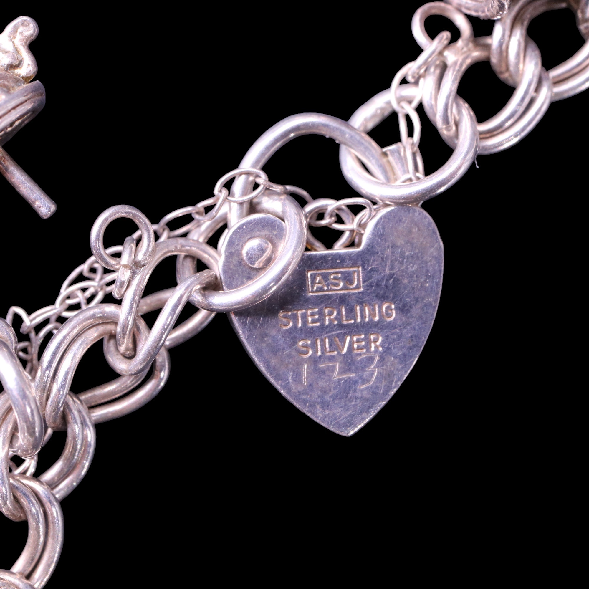A near-contemporary silver charm bracelet, 47 g - Image 5 of 5