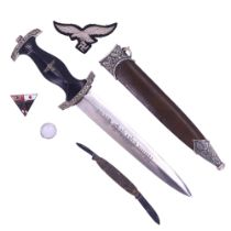 A German dagger, folding knife, ring and badges, (not period)