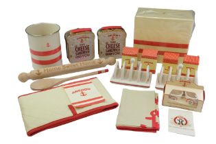 A group of Anchor Original Butter Co 125th anniversary collectibles including a ceramic toast