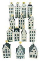 A group of Blue Delft's KLM Bols ceramic decanters in the form of Dutch houses, tallest 11.5 cm