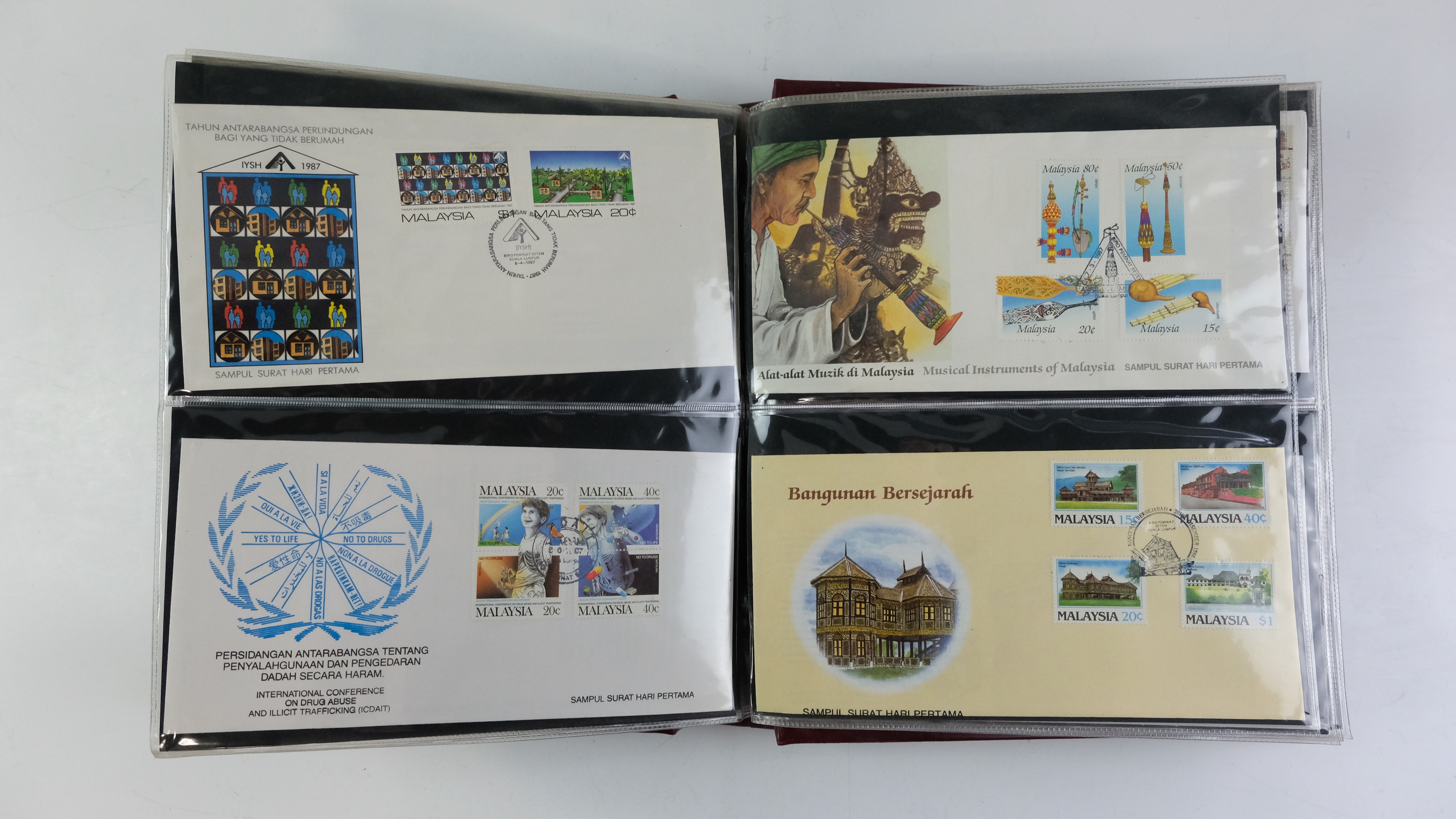 A large quantity of albums containing various world stamp covers including royal commemoratives, - Image 139 of 154